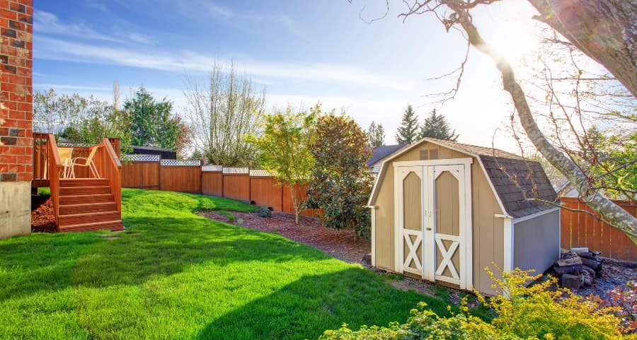 Fenced backyard with storage shed in Nashville